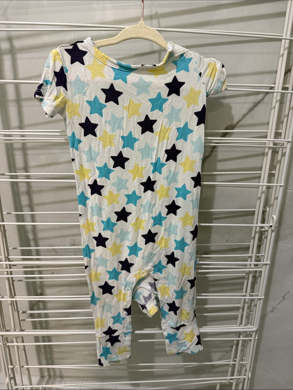 Star Print Baby Romper in White with Teal, Yellow, and Navy Stars posh peanut